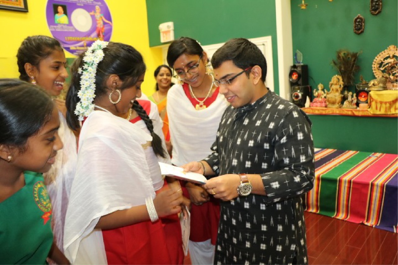 Abilash giriprasad with his students in classes