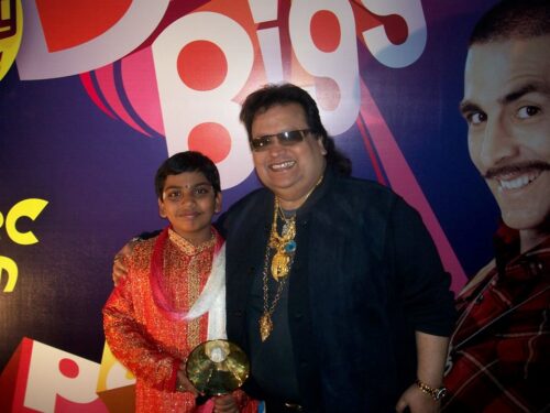 Abilash Giriprasad With Bappi Lahiri after winning Pogo Amazing Kids Awards