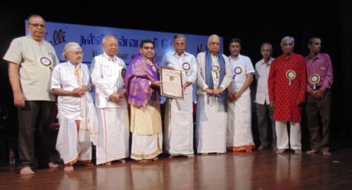 Abilash giriprasad receiving award